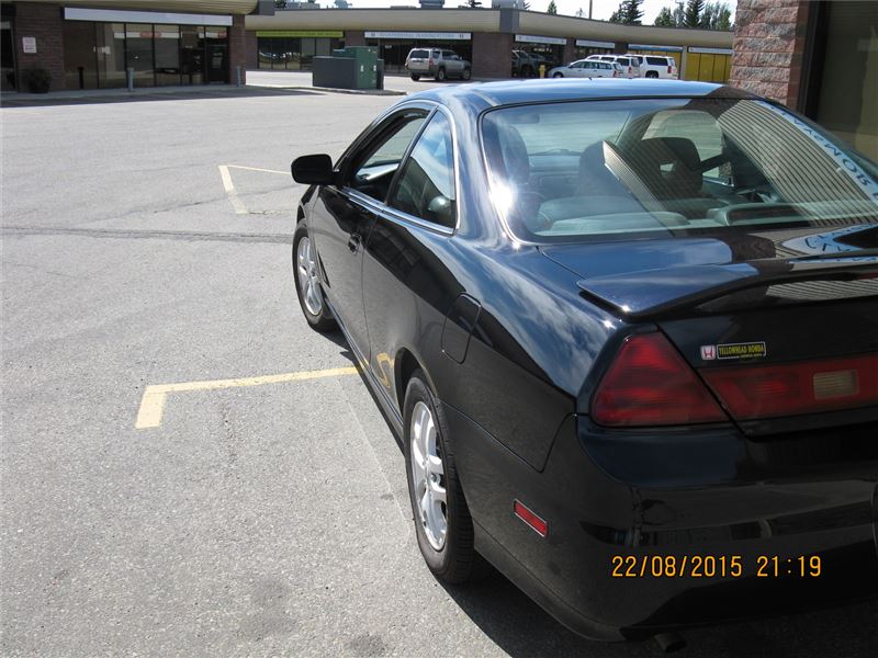 What does this gold honda sticker on the back of this accord mean