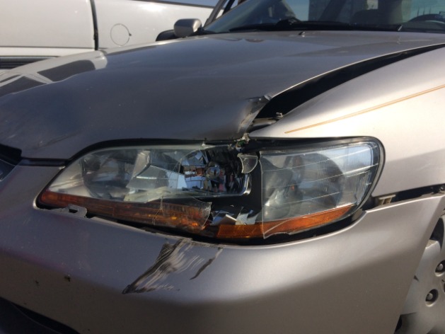 How much would it cost to fix a headlight and the corner of a hood