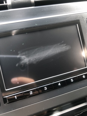 What can I do to take off white, bubbly, hazy mark off my car display screen